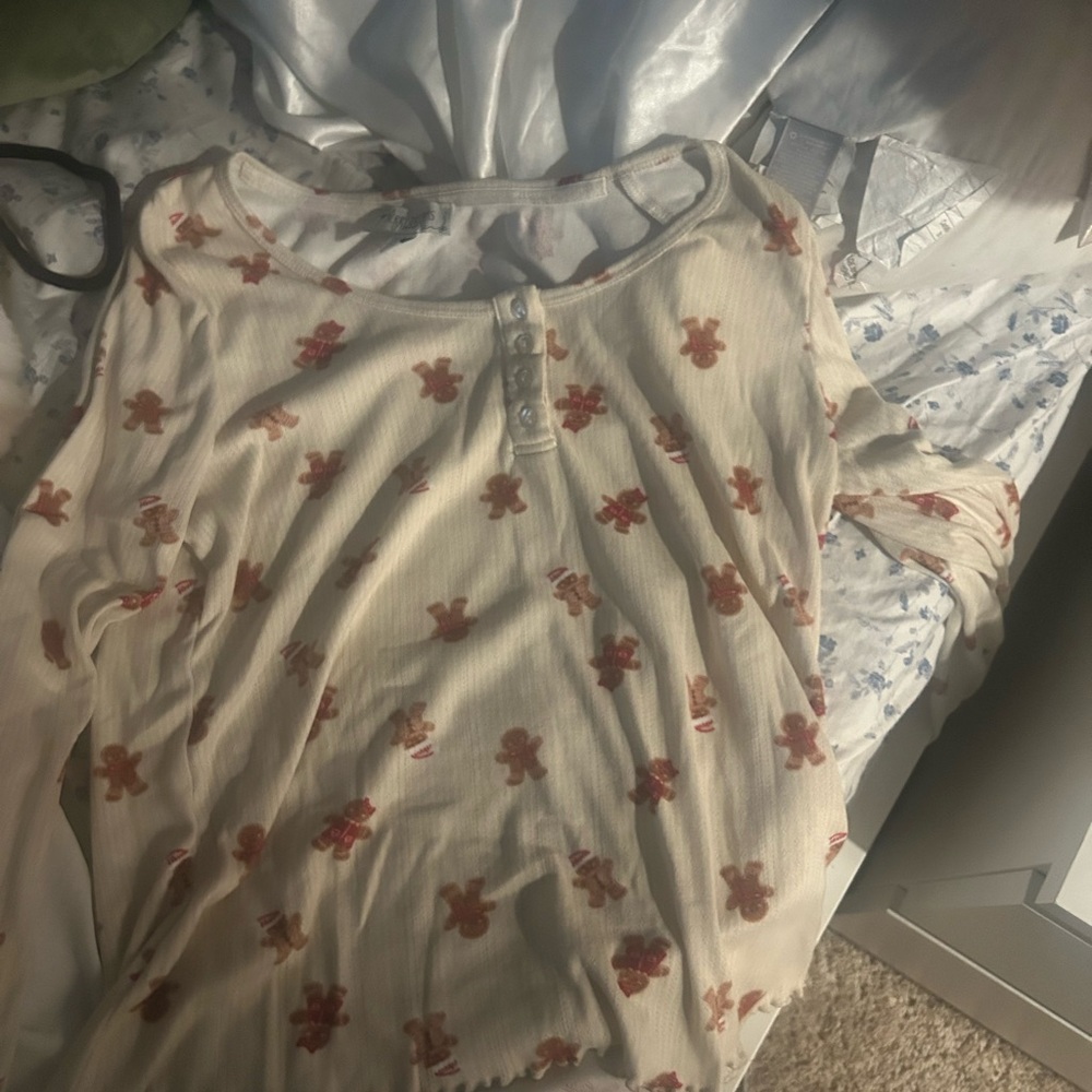 Chic Cream Long Sleeve Top with Red Floral Design